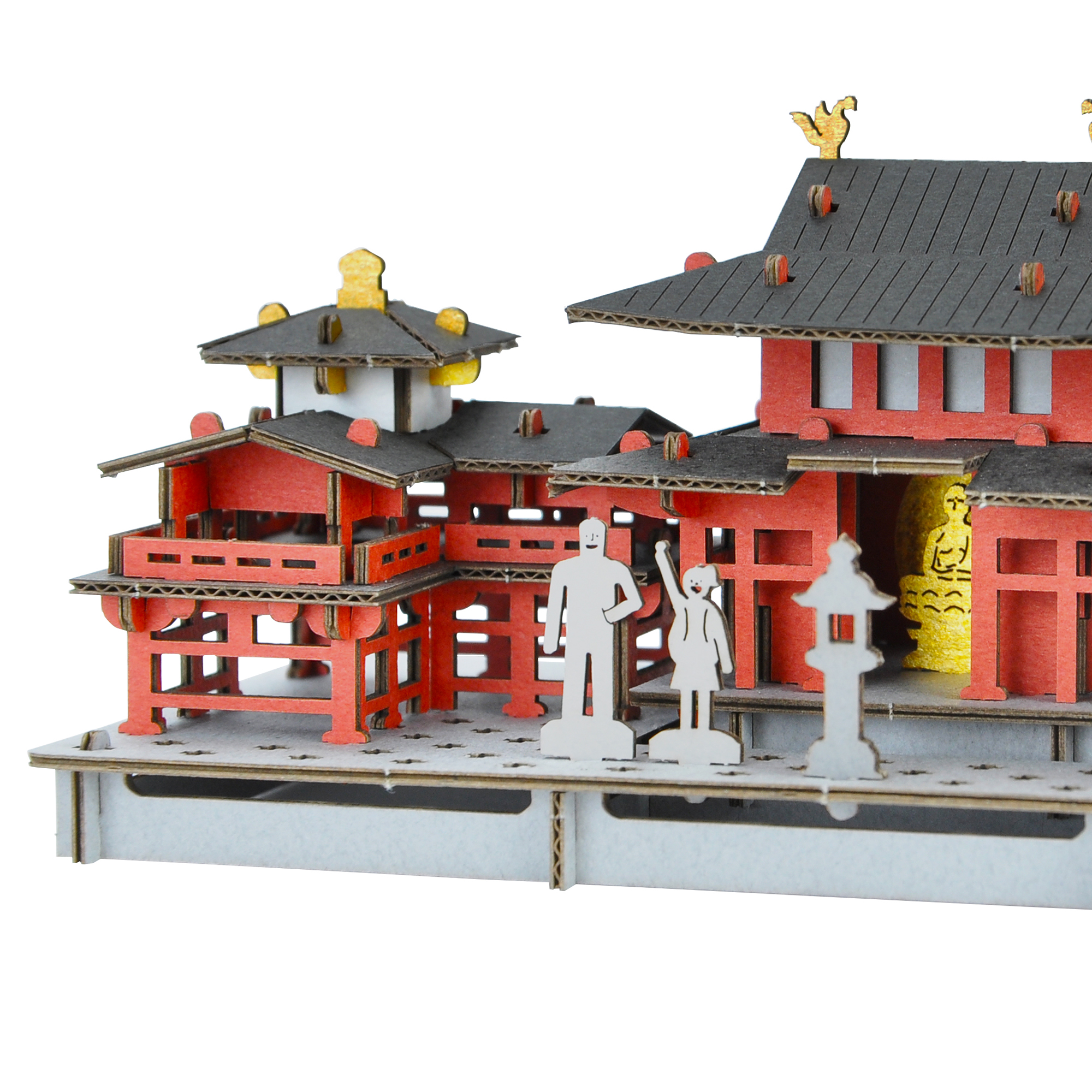 Une Maquette Miniature Dorée Du Temple Et Un Arbre Avec Des