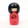 Japanese kokeshi doll with young girl motif in red, AKA OSANAGO
