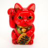 La zampa destra del gatto rosso gigante ha sollevato il salvadanaio giapponese manekineko, NEKO AKA