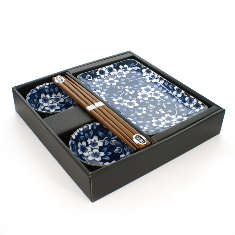 2 plates 2 bowls set with flower patterns and pairs of chopsticks white and blue SHIMITSU