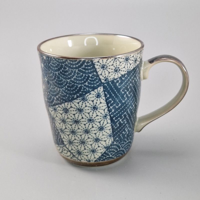 Japanese ceramic tea cup with handle, blue and white, patchwork pattern